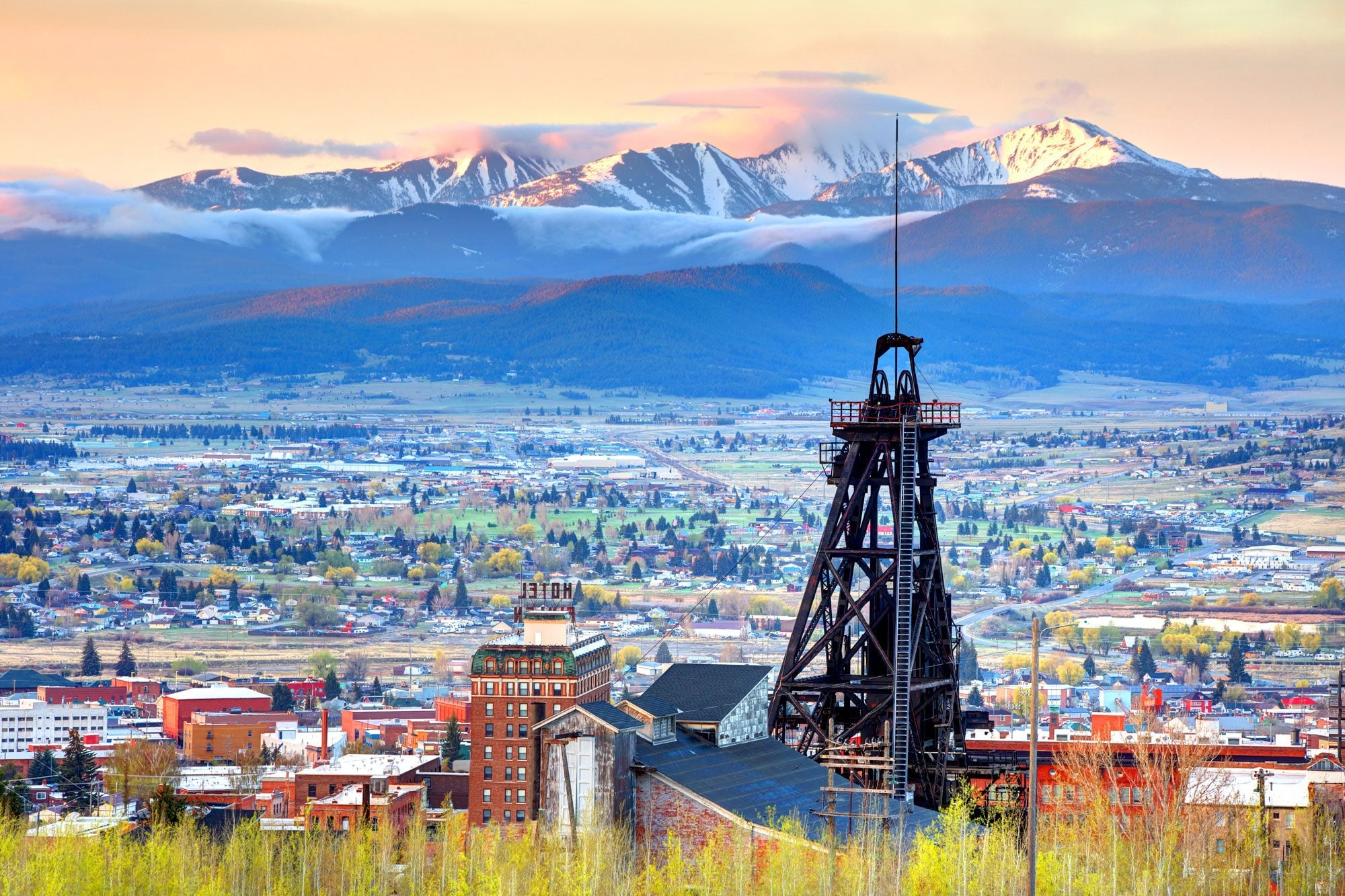 Butte Montana headframe overlooking town and mountains
